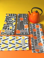Load image into Gallery viewer,  Yellow and orange teatowels
