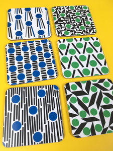 Blue square cork and melamine coasters. 